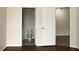 Bathroom and bonus room are accessible from a main room with hard wood floors at 5613 Legacy Crescent Pl # 201, Riverview, FL 33578