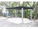 Community parking area with a modern electric vehicle (EV) charging station at 5613 Legacy Crescent Pl # 201, Riverview, FL 33578