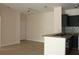 Modern kitchen featuring dark cabinetry, granite countertops, a tile backsplash, and a breakfast bar at 5613 Legacy Crescent Pl # 201, Riverview, FL 33578