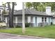 Mail kiosk for residents features multiple mailboxes in a building painted in neutral colors at 5613 Legacy Crescent Pl # 201, Riverview, FL 33578