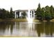 Community pond and fountain offer scenic views from this building with ample parking at 5613 Legacy Crescent Pl # 201, Riverview, FL 33578