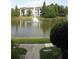Community pond and fountain offer scenic views from this building with ample parking at 5613 Legacy Crescent Pl # 201, Riverview, FL 33578