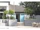 Image of a pool house building offering amenities with tiled roof and well-maintained landscaping at 5613 Legacy Crescent Pl # 201, Riverview, FL 33578