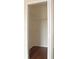 This walk-in closet has wire shelving and hardwood flooring at 5613 Legacy Crescent Pl # 201, Riverview, FL 33578