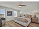 Cozy bedroom featuring a comfortable bed, soft lighting, and a peaceful atmosphere at 13610 Wolfpack Rd, Hudson, FL 34667