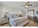Relaxing bedroom featuring a comfortable bed, stylish decor, and a peaceful atmosphere at 13610 Wolfpack Rd, Hudson, FL 34667