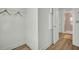 Functional walk-in closet with ample storage and easy access to bathroom at 14012 Emerald Fields Dr, Hudson, FL 34667
