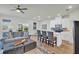 Open-concept living room and kitchen area, great for entertaining friends and Gathering at 14012 Emerald Fields Dr, Hudson, FL 34667