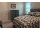 Cozy bedroom features a queen size bed, matching nightstands, and natural light at 16617 5Th E Ave, Bradenton, FL 34212