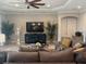 Comfortable living room with large TV, plants, and furniture at 16617 5Th E Ave, Bradenton, FL 34212