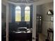 Bright home office featuring custom wood desk, natural light, and classic decor at 16617 5Th E Ave, Bradenton, FL 34212