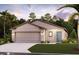 Charming single-story home with a well-manicured lawn and a two-car garage at 16818 Fiesta Dr, Port Charlotte, FL 33953