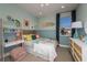 Bright and cozy bedroom featuring colorful decor, and natural light at 1688 Lugano Cir, Nokomis, FL 34275