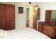 Bedroom with ample closet space, wood furniture, and a comfortable bed at 4154 57Th N St # 272, Kenneth City, FL 33709