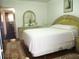 A bedroom with neutral tones, a comfortable bed, and a vanity at 4154 57Th N St # 272, Kenneth City, FL 33709