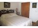 Cozy bedroom features a decorative headboard, soft bedding, and traditional furniture at 4154 57Th N St # 272, Kenneth City, FL 33709