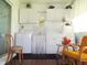 The sunroom features a washer, dryer, lots of storage, and relaxing furniture at 4154 57Th N St # 272, Kenneth City, FL 33709