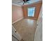Bedroom with tile flooring, window, and ceiling fan at 5552 Pentail Cir, Tampa, FL 33625