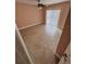 Bedroom with tile flooring, ceiling fan, and sliding glass door at 5552 Pentail Cir, Tampa, FL 33625