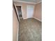 Bedroom featuring tile floors, closet, and neutral paint at 5552 Pentail Cir, Tampa, FL 33625