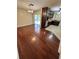 Dining room with hardwood floors and sliding glass doors leading to the pool area, perfect for entertaining at 5552 Pentail Cir, Tampa, FL 33625