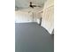 Garage featuring painted floors, laundry hookups, and closet space at 5552 Pentail Cir, Tampa, FL 33625