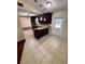 Bright kitchen featuring stainless steel appliances, granite counters, and outdoor access at 5552 Pentail Cir, Tampa, FL 33625