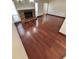 Spacious living room with hardwood floors and a cozy fireplace, creating a warm and inviting atmosphere at 5552 Pentail Cir, Tampa, FL 33625