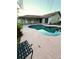 Private backyard pool area featuring a custom pool with covered patio, perfect for outdoor entertaining at 5552 Pentail Cir, Tampa, FL 33625