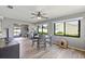 Dining room area featuring natural light with backyard view at 567 Whippoorwill Dr, Venice, FL 34293