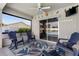 Enclosed patio with lounge chairs and a view of the backyard pool at 567 Whippoorwill Dr, Venice, FL 34293