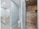 Updated bathroom with dual sinks, walk-in shower, and neutral color palette at 233 Snyder Dr, Venice, FL 34292