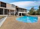 Stunning pool area with easy access to home and covered patio, offering a perfect outdoor living space at 233 Snyder Dr, Venice, FL 34292