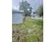 A view of the backyard of the home at 4934 Avery Rd, New Port Richey, FL 34652