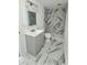 Bathroom with marble tile shower, vanity, and updated fixtures at 4934 Avery Rd, New Port Richey, FL 34652