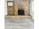 Stone fireplace as a feature of the house at 4934 Avery Rd, New Port Richey, FL 34652