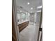 Modern bathroom with double vanity, large shower, and stylish flooring at 975 Coronado Dr, Punta Gorda, FL 33950