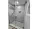 Large walk-in shower with modern tile and glass enclosure at 975 Coronado Dr, Punta Gorda, FL 33950