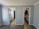 Main bedroom with en-suite bathroom and walk-in closet at 40610 State Road 64 E, Myakka City, FL 34251