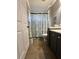 Clean bathroom with shower and vanity at 40610 State Road 64 E, Myakka City, FL 34251