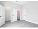 Bedroom with two closets and a neutral paint palette at 14112 Monserrate Ln, Port Charlotte, FL 33981