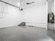 Epoxy-floor garage, with electric water heater on blocks at 14112 Monserrate Ln, Port Charlotte, FL 33981