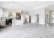 Open concept living and kitchen area with bright natural light and stylish finishes at 14112 Monserrate Ln, Port Charlotte, FL 33981