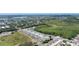 Aerial view of townhomes near water and residential areas at 3048 Victoria Inlet Dr, Holiday, FL 34691