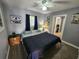 Bright bedroom with a queen-size bed and ensuite bathroom at 2309 22Nd W Ave, Bradenton, FL 34205