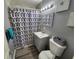 Bathroom with shower, toilet, vanity with sink, and updated fixtures at 2309 22Nd W Ave, Bradenton, FL 34205