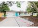 Charming ranch house with a newly paved driveway and landscaping at 4615 Lords Ave, Sarasota, FL 34231