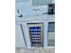Outdoor wine cooler built into the kitchen at 4229 Floramar Ter, New Port Richey, FL 34652