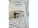 Small breakfast nook with a table and chairs, and marble flooring at 4229 Floramar Ter, New Port Richey, FL 34652