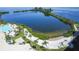 Aerial view of the community pool and private beach area at 6035 Sea Ranch Dr # 202, Hudson, FL 34667